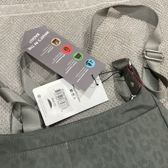 Baggallini. Brand new with tags. Grey with subtle cheetah print background. - Picture 6 of 12
